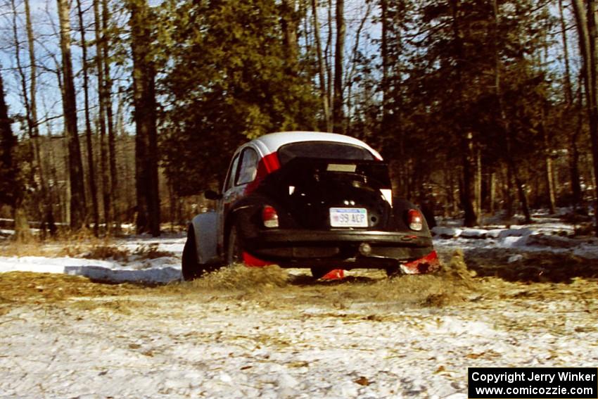 Reny Villemure / Mike Villemure slide their VW Beetle through the hairpin on SS7, Ranch II.