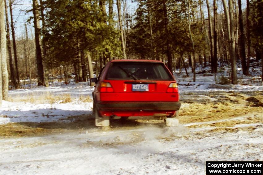 The Josh Scott / Roxanne Slancik VW GTI takes the hairpin on SS7, Ranch II.