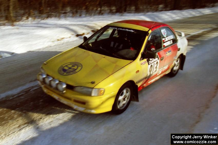 Janusz Jastrzebski / Marcin Korneluk at speed on SS9, Avery Lake II, in their Subaru Impreza.