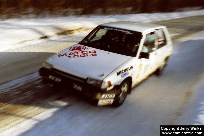 The Mark Brown / Ole Holter Toyota Corolla FX-16 at speed on SS9, Avery Lake II.