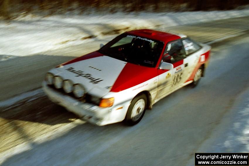 The Jon Bogert / Daphne Bogert Toyota Celica All-Trac at speed on SS9, Avery Lake II, before sunset.