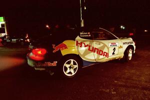 The Paul Choiniere / Jeff Becker Hyundai Tiburon prepares to leave service before SS16, the final stage.