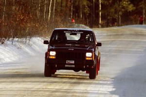 Scott Carlborn / Dale Dewald leave the start on SS9, Avery Lake II, late in the day in their Jeep Comanche.