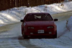 Jouni Pohjolainen / John Matikainen at speed on SS9, Avery Lake II, in their Nissan NX200 before sundown.