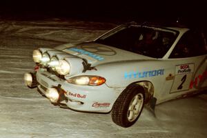 The Paul Choiniere / Jeff Becker Hyundai Tiburon drifts through a 90-left on SS16, the final stage.