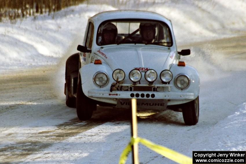 Reny Villemure / Mike Villemure at speed on SS9, Avery Lake II, before sundown in their VW Beetle.