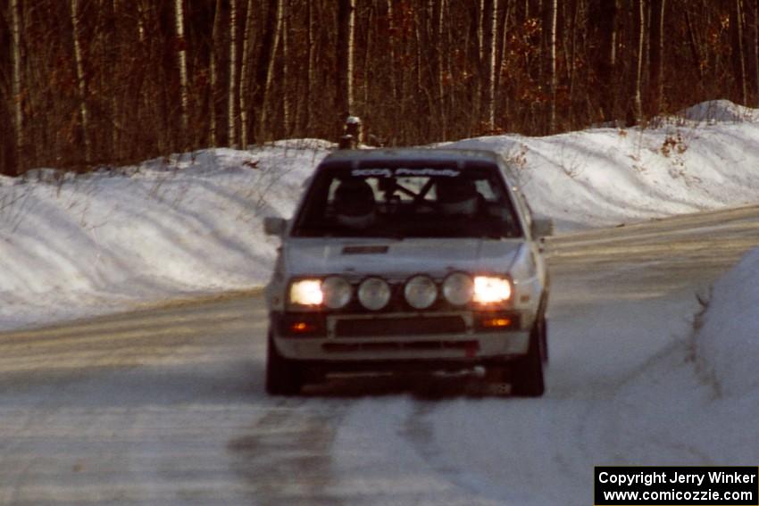 The Brad Hawkins / Adrian Wintle VW Jetta at speed on SS9, Avery Lake II, just before sunset.