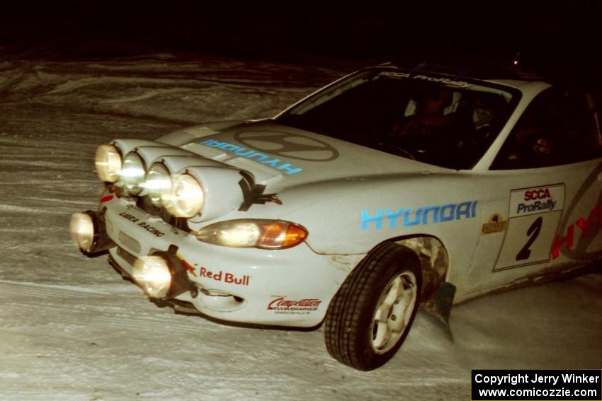 The Paul Choiniere / Jeff Becker Hyundai Tiburon drifts through a 90-left on SS16, the final stage.