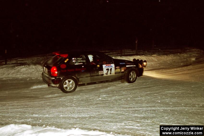 Bryan Hourt / Pete Cardimen drift their Honda Civic through a 90-left on SS16, the final stage.