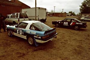 The Doug Dill / Dave Fuss Mazda RX-7 and Mike Hurst / Rob Bohn Pontiac Sunbird Turbo before the event.