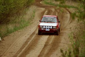 Mike Halley / Emily Burton-Weinman at speed on SS1, Indian Creek Rd., in their VW Rabbit.