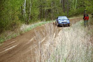 Kendall Russell / Russ Hughes drift their Dodge Shadow through a 90-left on Indian Creek Rd., SS1.