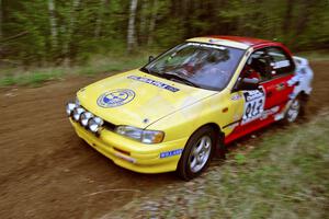 Janusz Jastrzebski / Kazimierz Pudelek drift their Subaru Impreza through a corner on Indian Creek Rd., SS1.