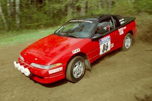 The Mark Larson / Kelly Cox Eagle Talon drifts through the first corner of Indian Creek Rd., SS1.