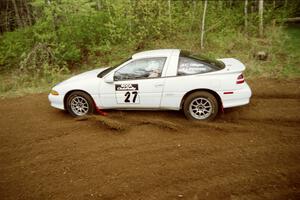 Chris Gilligan / Joe Petersen drift wide into the first corner of Indian Creek Rd., SS1, in their Mistubishi Eclipse GSX.