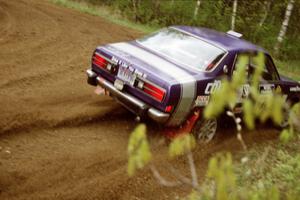 Mark Kleckner / Jeff Hribar go straight off the road at the first corner of SS1 in their Dodge Colt.