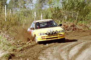 Janusz Jastrzebski / Kazimierz Pudelek drift their Subaru Impreza wide at a sweeper in the Two Inlets State Forest.