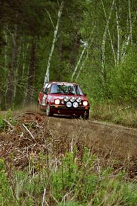 The J.B. Niday / Al Kintigh VW GTI drifts through a blind sweeper in the Two Inlets State Forest.