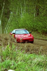 The Randy Bailey / Will Perry Toyota MR-2 carries too much speed through a corner and starts to go off.