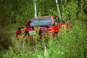 Randy Bailey / Will Perry get their Toyota MR-2 back on the road after a high-speed off in the Two Inlets State Forest.