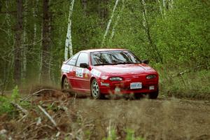 Jouni Pohjolainen / John Matikainen in their Nissan NX2000 in the Two Inlets State Forest.