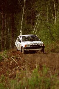 John Zoerner / John Shepski at speed in their Dodge Omni GLH-Turbo through the Two Inlets State Forest.