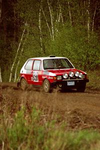 John Adleman / Jason Lajon drift their VW GTI through a fast sweeper in the Two Inlets State Forest.