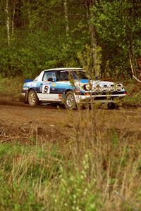 The Doug Dill / Dave Fuss Mazda RX-7 at speed in the Two Inlets State Forest.