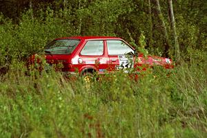 The Paul Peters / Bob Anderson Subaru GL drives through the Two Inlets State Forest.