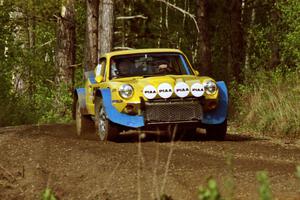 The Paul Moorman / Diane Sargent SAAB Sonett II at speed in the Two Inlets State Forest.