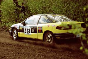 Rich Pankratz / Dick Lubotina at speed in the Two Inlets State Forest in their Saturn SL1.