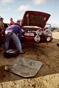 Todd Erickson works on the Eric Seppanen / Jake Himes Nissan Sentra SE-R at service.