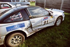The Chris Czyzio / Eric Carlson Mitsubishi Eclipse GSX had massive damage to the car after hitting an uprooted stump at speed.