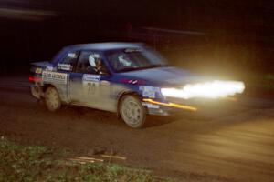 Kendall Russell / Russ Hughes at speed in their Dodge Shadow at the crossroads spectator location.