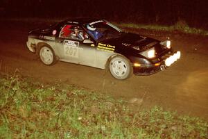 Dave Hintz / Doug Chase in their Mazda RX-7 at the crossroads spectator area.