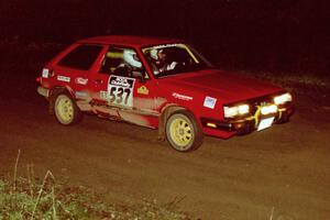 Paul Peters / Bob Anderson drive their Subaru GL past the crossroads spectator point.