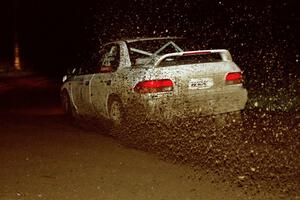 Henry Krolikowski / Cindy Krolikowski drift their Subaru WRX on the final stage of the event.