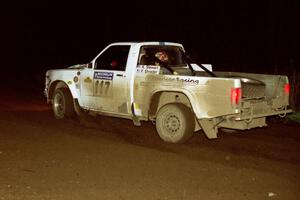 Ken Stewart / Doc Shrader set their Chevy S-10 up for a 90-right on the final stage of the evening.