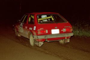 Paul Peters / Bob Anderson drive their Subaru GL through a corner on the final stage.