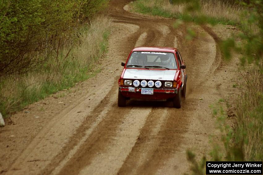 Mike Halley / Emily Burton-Weinman at speed on SS1, Indian Creek Rd., in their VW Rabbit.