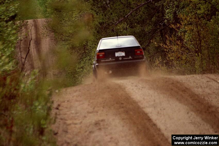 Paula Gibeault / Chrissie Beavis at speed on SS1 in their VW Jetta.