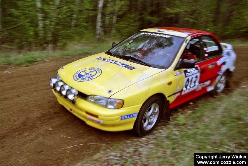 Janusz Jastrzebski / Kazimierz Pudelek drift their Subaru Impreza through a corner on Indian Creek Rd., SS1.