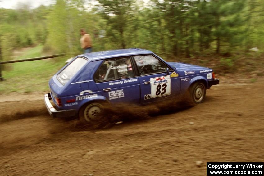 Mark Utecht / Brenda Corneliusen in their Dodge Omni GLH-Turbo at the first corner of SS1.