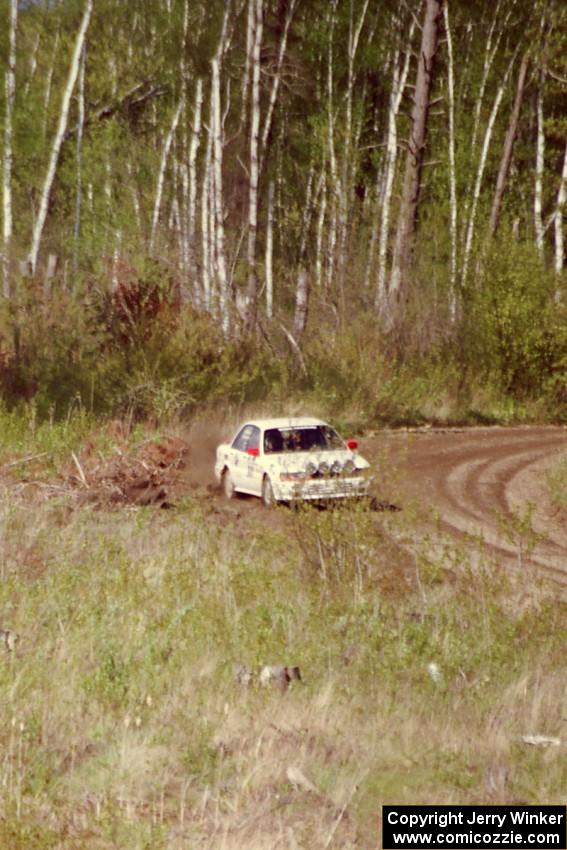 The Todd Jarvey / Rich Faber Mitsubishi Galant VR-4 at speed in the Two Inlets State Forest.