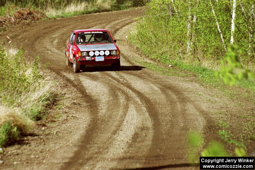 Mike Halley / Emily Burton-Weinman through a series of fast sweepers in the Two Inlets State Forest in their VW Rabbit.