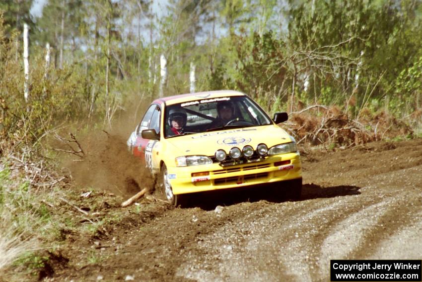 Janusz Jastrzebski / Kazimierz Pudelek drift their Subaru Impreza wide at a sweeper in the Two Inlets State Forest.