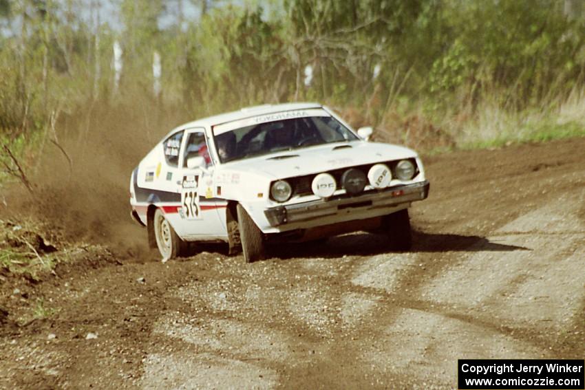 Jeremy Butts / Jon Vrzal in their Plymouth Arrow hang the tail out at a sweeper in the Two Inlets State Forest.