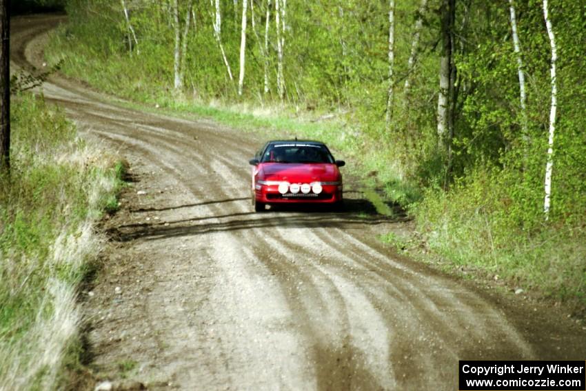 Mark Larson / Kelly Cox at speed in the Two Inlets State Forest in their Eagle Talon.