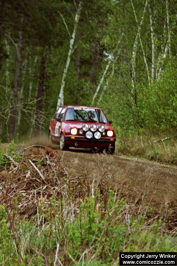 The J.B. Niday / Al Kintigh VW GTI drifts through a blind sweeper in the Two Inlets State Forest.