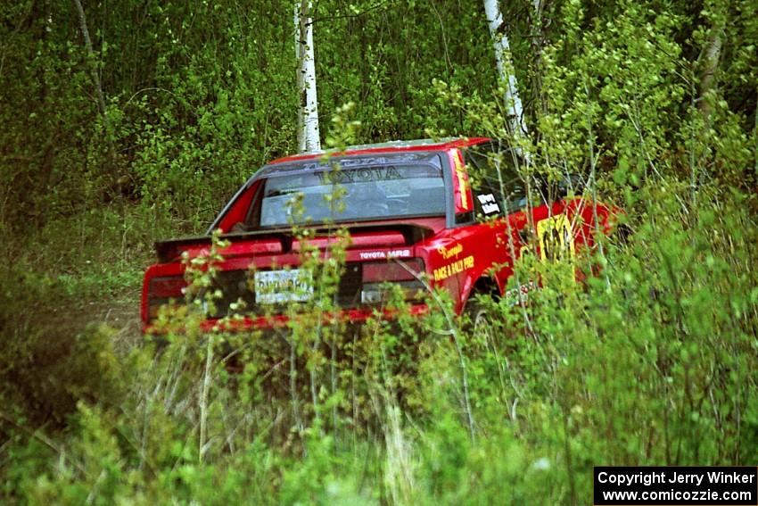 Randy Bailey / Will Perry get their Toyota MR-2 back on the road after a high-speed off in the Two Inlets State Forest.